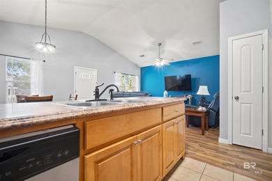 Welcome home to this precious cottage tucked away on a quiet on Lake Forest Yacht and Country Club in Alabama - for sale on GolfHomes.com, golf home, golf lot