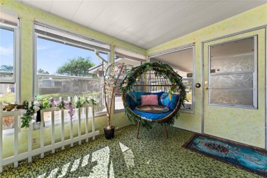 **TWO SUN PORCHES, NO REAR NEIGHBORS!**

Step into your own on Bay Tree Golf Course in Florida - for sale on GolfHomes.com, golf home, golf lot