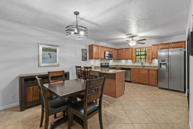 Charming and spacious 2-bedroom, 2-bathroom townhome located on Heritage Ridge Golf Club in Florida - for sale on GolfHomes.com, golf home, golf lot
