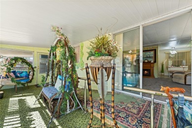 **TWO SUN PORCHES, NO REAR NEIGHBORS!**

Step into your own on Bay Tree Golf Course in Florida - for sale on GolfHomes.com, golf home, golf lot