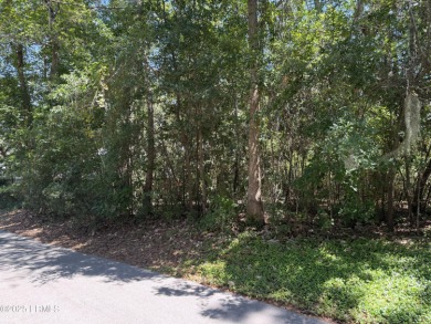 Vacant homesite situated on the 13th hole of the Cotton Dike on Dataw Island Club in South Carolina - for sale on GolfHomes.com, golf home, golf lot