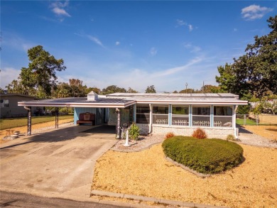 **TWO SUN PORCHES, NO REAR NEIGHBORS!**

Step into your own on Bay Tree Golf Course in Florida - for sale on GolfHomes.com, golf home, golf lot