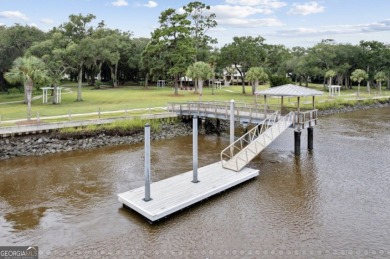 Beautiful custom designed home is a coastal retreat located in on The Golf Club At Sanctuary Cove in Georgia - for sale on GolfHomes.com, golf home, golf lot