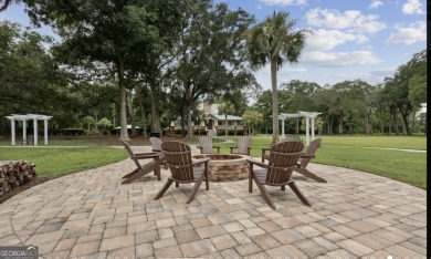 Beautiful custom designed home is a coastal retreat located in on The Golf Club At Sanctuary Cove in Georgia - for sale on GolfHomes.com, golf home, golf lot