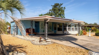 **TWO SUN PORCHES, NO REAR NEIGHBORS!**

Step into your own on Bay Tree Golf Course in Florida - for sale on GolfHomes.com, golf home, golf lot