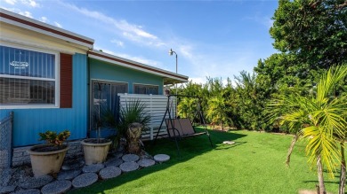 **TWO SUN PORCHES, NO REAR NEIGHBORS!**

Step into your own on Bay Tree Golf Course in Florida - for sale on GolfHomes.com, golf home, golf lot