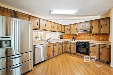 Nestled in a quiet cul-de-sac, 102 Cameron Circle is the perfect on Lake Forest Yacht and Country Club in Alabama - for sale on GolfHomes.com, golf home, golf lot