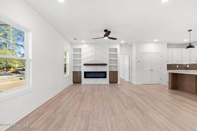 The Wow factor is what this 2600 sq ft Custom Beauty is all on Brunswick Plantation and Golf Resorts in North Carolina - for sale on GolfHomes.com, golf home, golf lot