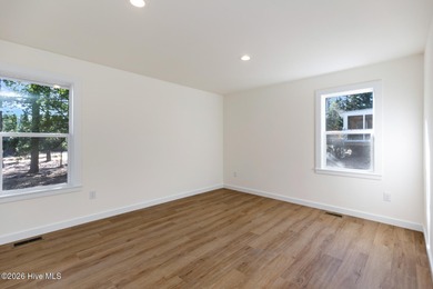 Recently renovated golf-front home perfectly positioned on the on Seven Lakes Country Club in North Carolina - for sale on GolfHomes.com, golf home, golf lot