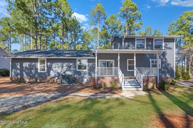 Recently renovated golf-front home perfectly positioned on the on Seven Lakes Country Club in North Carolina - for sale on GolfHomes.com, golf home, golf lot