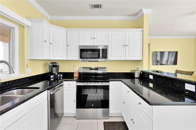 Enjoy stunning views of the aqua range and 9th fairway from this on Oak Harbor Country Club in Florida - for sale on GolfHomes.com, golf home, golf lot