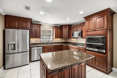 Welcome home to 337 Louise Circle, where thoughtful design on Indian Bayou Golf and Country Club in Florida - for sale on GolfHomes.com, golf home, golf lot