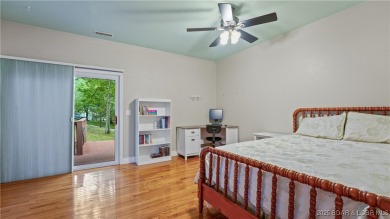 Rare 5-bedroom, 4.5-bath home in Hawk Island Estates! Inside on The Oaks Golf Course in Missouri - for sale on GolfHomes.com, golf home, golf lot