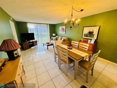 This inviting 55+ community condo offers an exceptional blend of on Sunrise Lakes Phase IV Golf Course in Florida - for sale on GolfHomes.com, golf home, golf lot