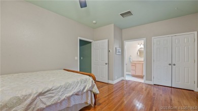 Rare 5-bedroom, 4.5-bath home in Hawk Island Estates! Inside on The Oaks Golf Course in Missouri - for sale on GolfHomes.com, golf home, golf lot