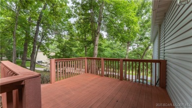 Rare 5-bedroom, 4.5-bath home in Hawk Island Estates! Inside on The Oaks Golf Course in Missouri - for sale on GolfHomes.com, golf home, golf lot