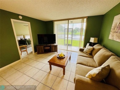 This inviting 55+ community condo offers an exceptional blend of on Sunrise Lakes Phase IV Golf Course in Florida - for sale on GolfHomes.com, golf home, golf lot