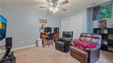 Rare 5-bedroom, 4.5-bath home in Hawk Island Estates! Inside on The Oaks Golf Course in Missouri - for sale on GolfHomes.com, golf home, golf lot
