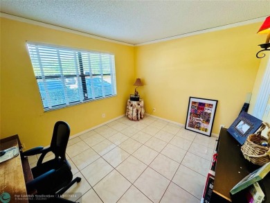 This inviting 55+ community condo offers an exceptional blend of on Sunrise Lakes Phase IV Golf Course in Florida - for sale on GolfHomes.com, golf home, golf lot