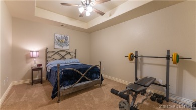 Rare 5-bedroom, 4.5-bath home in Hawk Island Estates! Inside on The Oaks Golf Course in Missouri - for sale on GolfHomes.com, golf home, golf lot