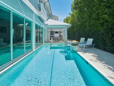 Location, luxury, and a nice street legal electric golf cart on Naples Beach Hotel and Golf Club in Florida - for sale on GolfHomes.com, golf home, golf lot