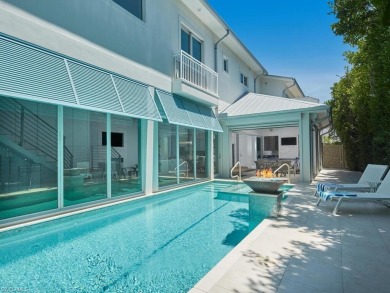 Location, luxury, and a nice street legal electric golf cart on Naples Beach Hotel and Golf Club in Florida - for sale on GolfHomes.com, golf home, golf lot