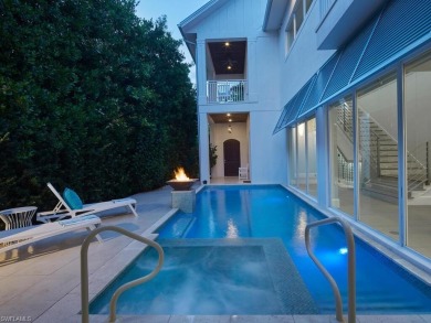 Location, luxury, and a nice street legal electric golf cart on Naples Beach Hotel and Golf Club in Florida - for sale on GolfHomes.com, golf home, golf lot