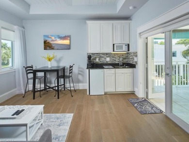 Location, luxury, and a nice street legal electric golf cart on Naples Beach Hotel and Golf Club in Florida - for sale on GolfHomes.com, golf home, golf lot