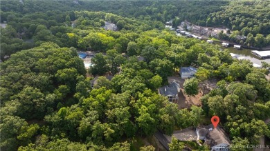 Rare 5-bedroom, 4.5-bath home in Hawk Island Estates! Inside on The Oaks Golf Course in Missouri - for sale on GolfHomes.com, golf home, golf lot
