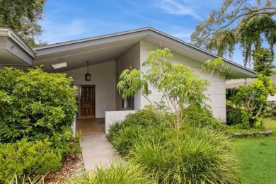 Tucked inside a charming Cul de sac, this 3 bedroom, 2 bath plus on The Dunedin Country Club in Florida - for sale on GolfHomes.com, golf home, golf lot