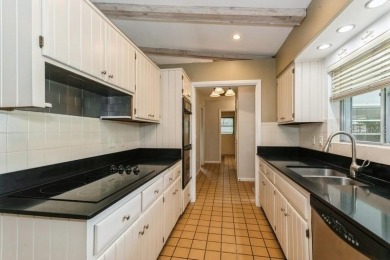 Tucked inside a charming Cul de sac, this 3 bedroom, 2 bath plus on The Dunedin Country Club in Florida - for sale on GolfHomes.com, golf home, golf lot