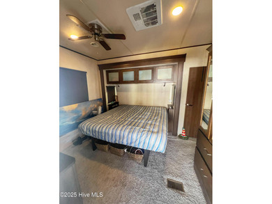 Adorable, newer camper with fabulous attached covered porch. 1 on North Shore Country Club in North Carolina - for sale on GolfHomes.com, golf home, golf lot