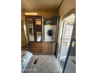 Adorable, newer camper with fabulous attached covered porch. 1 on North Shore Country Club in North Carolina - for sale on GolfHomes.com, golf home, golf lot