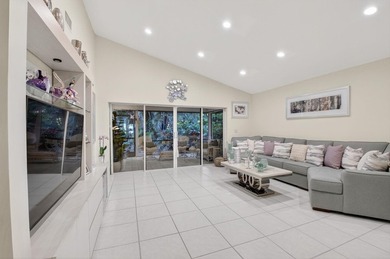 Welcome to this beautifully maintained and thoughtfully on Boca West Golf and Country Club in Florida - for sale on GolfHomes.com, golf home, golf lot