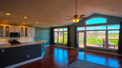 Experience luxury and privacy in this stunning Rhodes-built home on The Golf Club At Yankee Trace in Ohio - for sale on GolfHomes.com, golf home, golf lot