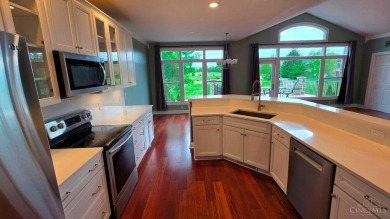 Experience luxury and privacy in this stunning Rhodes-built home on The Golf Club At Yankee Trace in Ohio - for sale on GolfHomes.com, golf home, golf lot