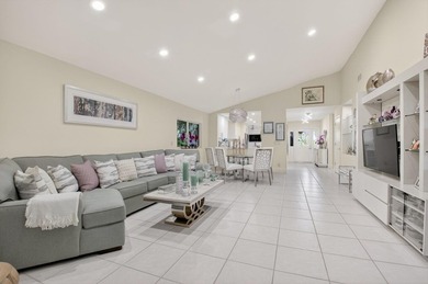 Welcome to this beautifully maintained and thoughtfully on Boca West Golf and Country Club in Florida - for sale on GolfHomes.com, golf home, golf lot