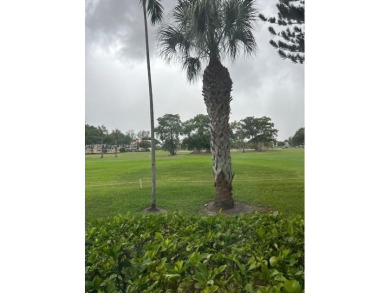 Beautifully maintained 2-bedroom, 2-bathroom condo nestled in a on Oriole Golf and Tennis Club in Florida - for sale on GolfHomes.com, golf home, golf lot
