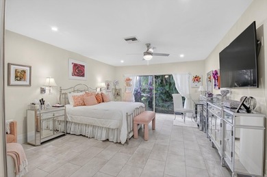 Welcome to this beautifully maintained and thoughtfully on Boca West Golf and Country Club in Florida - for sale on GolfHomes.com, golf home, golf lot