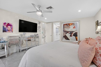 Welcome to this beautifully maintained and thoughtfully on Boca West Golf and Country Club in Florida - for sale on GolfHomes.com, golf home, golf lot