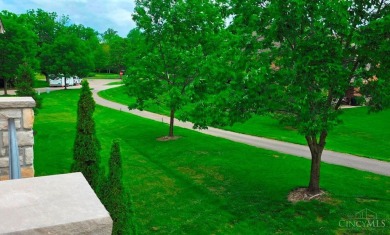 Experience luxury and privacy in this stunning Rhodes-built home on The Golf Club At Yankee Trace in Ohio - for sale on GolfHomes.com, golf home, golf lot