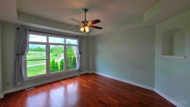 Experience luxury and privacy in this stunning Rhodes-built home on The Golf Club At Yankee Trace in Ohio - for sale on GolfHomes.com, golf home, golf lot