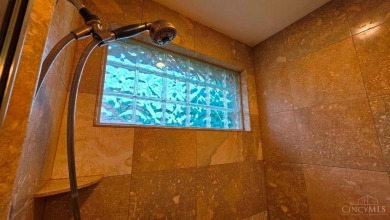 Experience luxury and privacy in this stunning Rhodes-built home on The Golf Club At Yankee Trace in Ohio - for sale on GolfHomes.com, golf home, golf lot