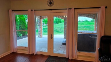 Experience luxury and privacy in this stunning Rhodes-built home on The Golf Club At Yankee Trace in Ohio - for sale on GolfHomes.com, golf home, golf lot