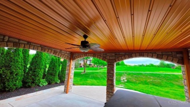 Experience luxury and privacy in this stunning Rhodes-built home on The Golf Club At Yankee Trace in Ohio - for sale on GolfHomes.com, golf home, golf lot