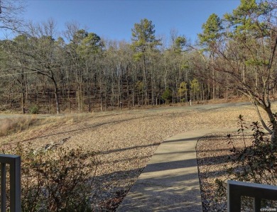 The owner has clearly taken great pride in maintaining this on Diamondhead Golf and Country Club in Arkansas - for sale on GolfHomes.com, golf home, golf lot