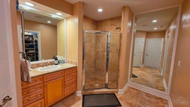Experience luxury and privacy in this stunning Rhodes-built home on The Golf Club At Yankee Trace in Ohio - for sale on GolfHomes.com, golf home, golf lot