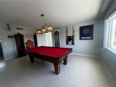 This Adorable Pool Home is located at the end of a cul-de-sac on on Port Charlotte Golf Club in Florida - for sale on GolfHomes.com, golf home, golf lot