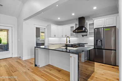 Tucked away on a peaceful cul-de-sac in Tellico Village's on Toqua Golf Course - Loudon County in Tennessee - for sale on GolfHomes.com, golf home, golf lot