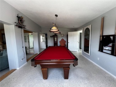 This Adorable Pool Home is located at the end of a cul-de-sac on on Port Charlotte Golf Club in Florida - for sale on GolfHomes.com, golf home, golf lot